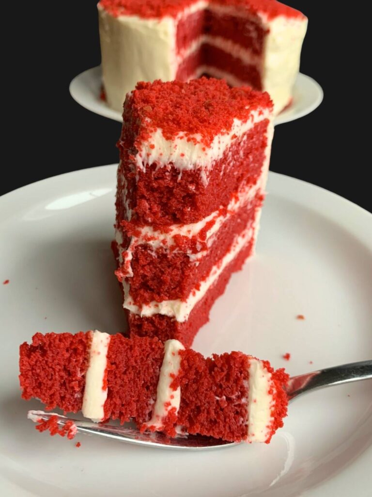 red velvet cake with a bite on a fork