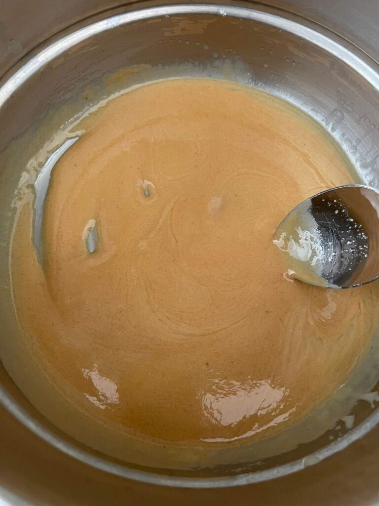 the mixture after adding peanut butter to the butter and allulose