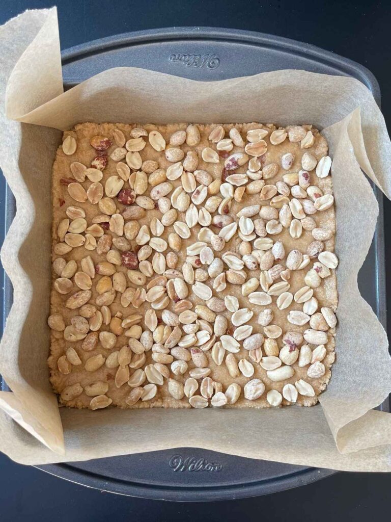 peanuts added on top of the nougat