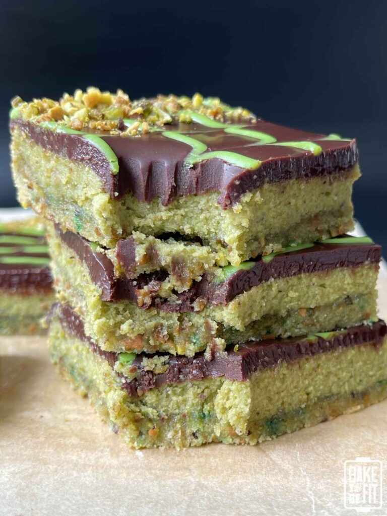 stack of keto dubai chocolate bars with a bite taken out